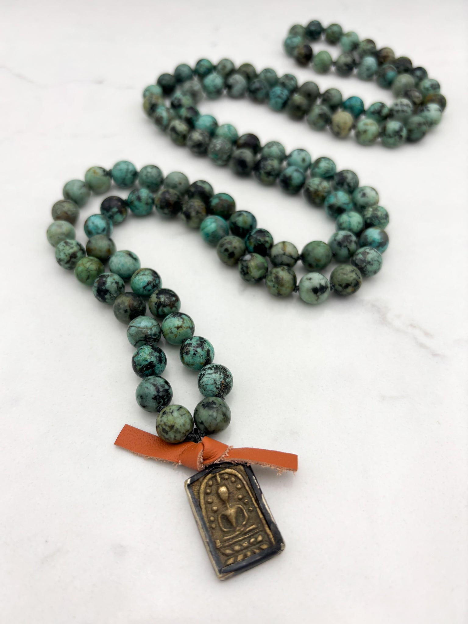 african turquoise gemstone mala with buddha pendant | radiant malas | handmade in boulder, colorado