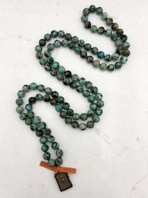 african turquoise gemstone mala with buddha pendant | radiant malas | handmade in boulder, colorado