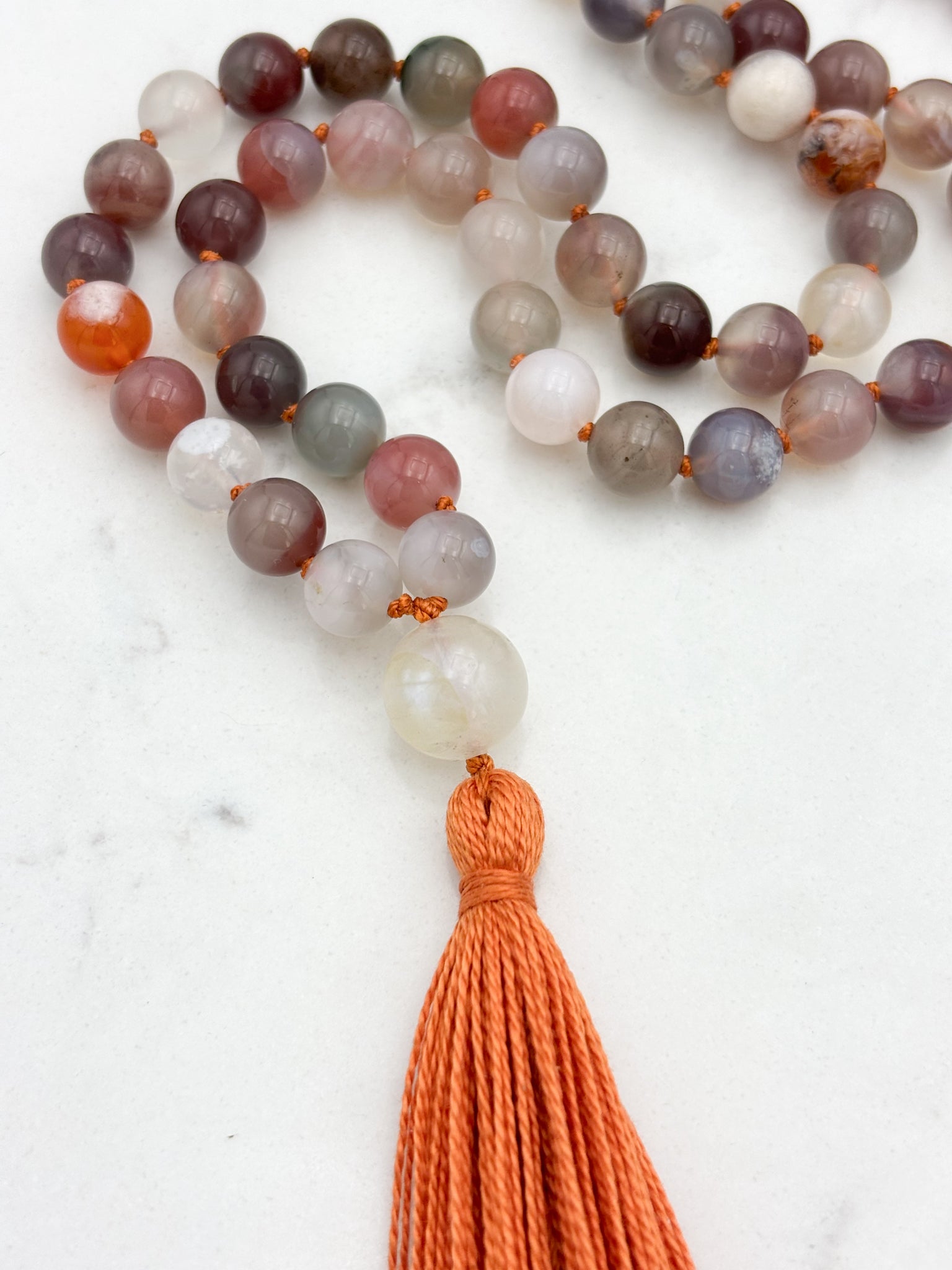 african phantom agate gemstone mala with moonstone guru bead and orange tassel | radiant malas | handmade in boulder, colorado