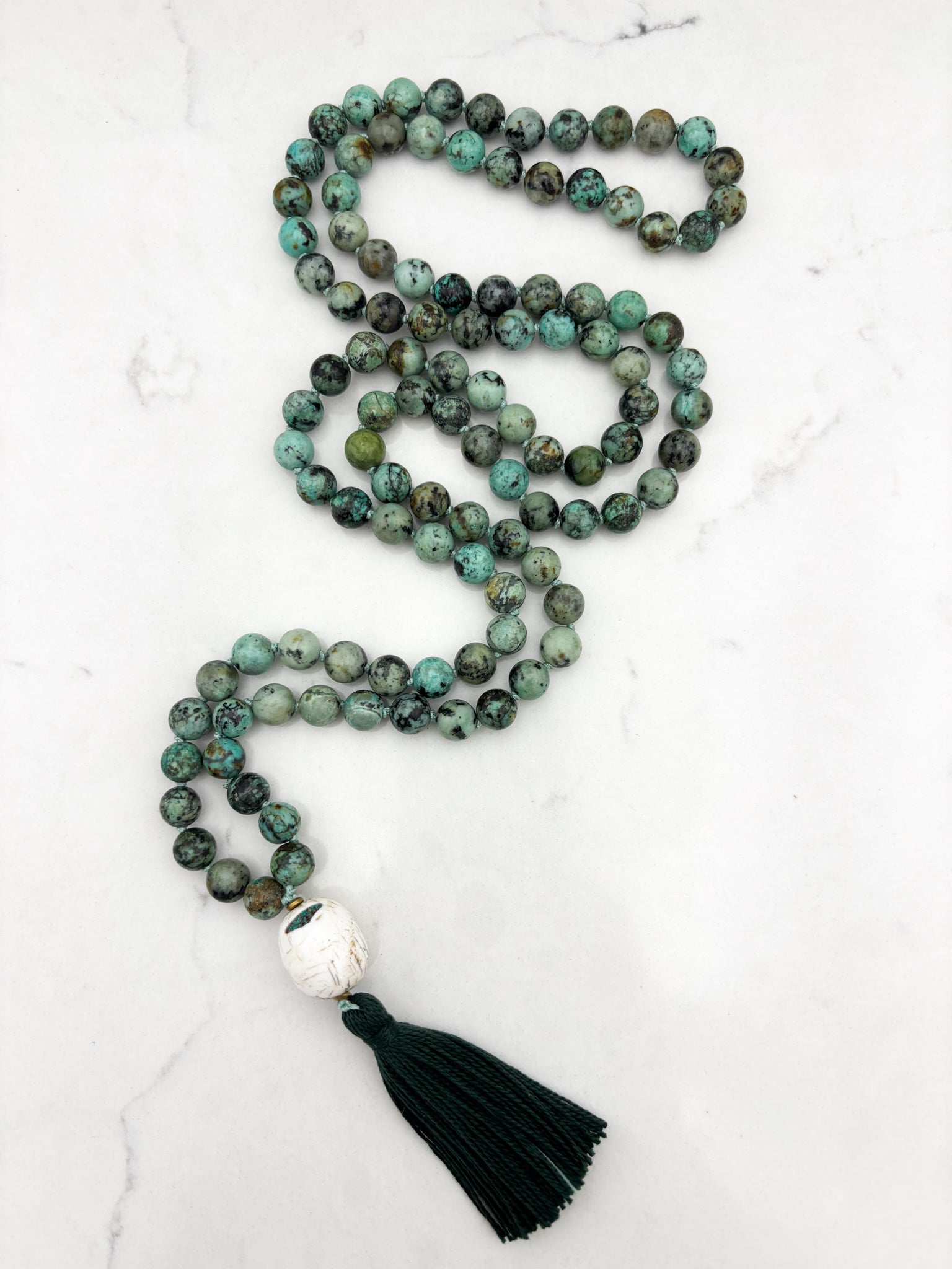 African turquoise gemstone mala with bone guru bead and dark green tassel | radiant malas | handmade in boulder, colorado