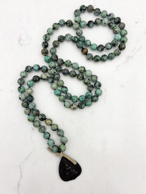 african turquoise gemstone mala with buddha pendant | radiant malas | handmade in boulder, colorado