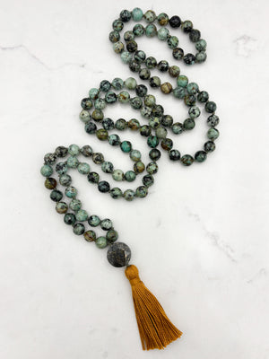 african turquoise gemstone mala with faceted pyrite guru bead and gold tassel | radiant malas | handmade in boulder, colorado