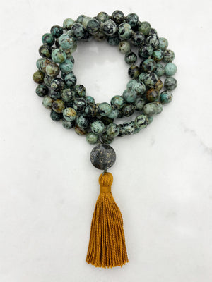 african turquoise gemstone mala with faceted pyrite guru bead and gold tassel | radiant malas | handmade in boulder, colorado