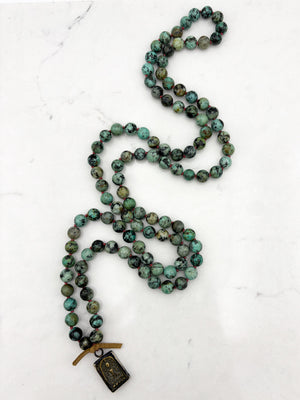 african turquoise gemstone mala with brass pendant | radiant malas | handmade in boulder, colorado		