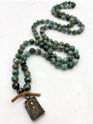 african turquoise gemstone mala with brass pendant | radiant malas | handmade in boulder, colorado		