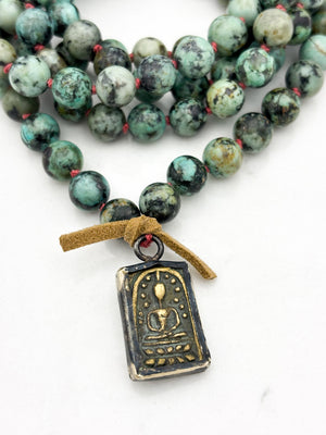 african turquoise gemstone mala with brass pendant | radiant malas | handmade in boulder, colorado																							