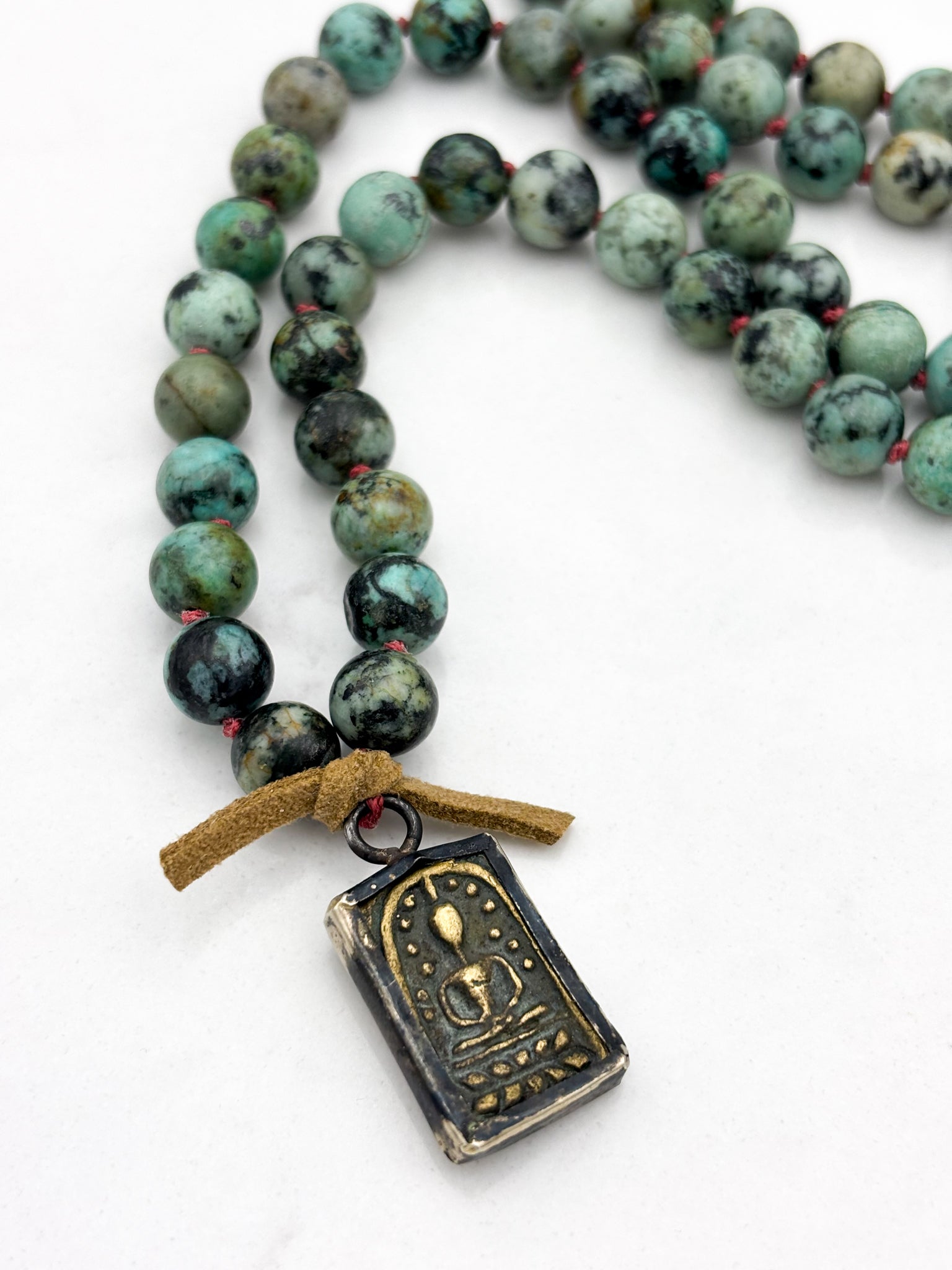 african turquoise gemstone mala with brass pendant | radiant malas | handmade in boulder, colorado		