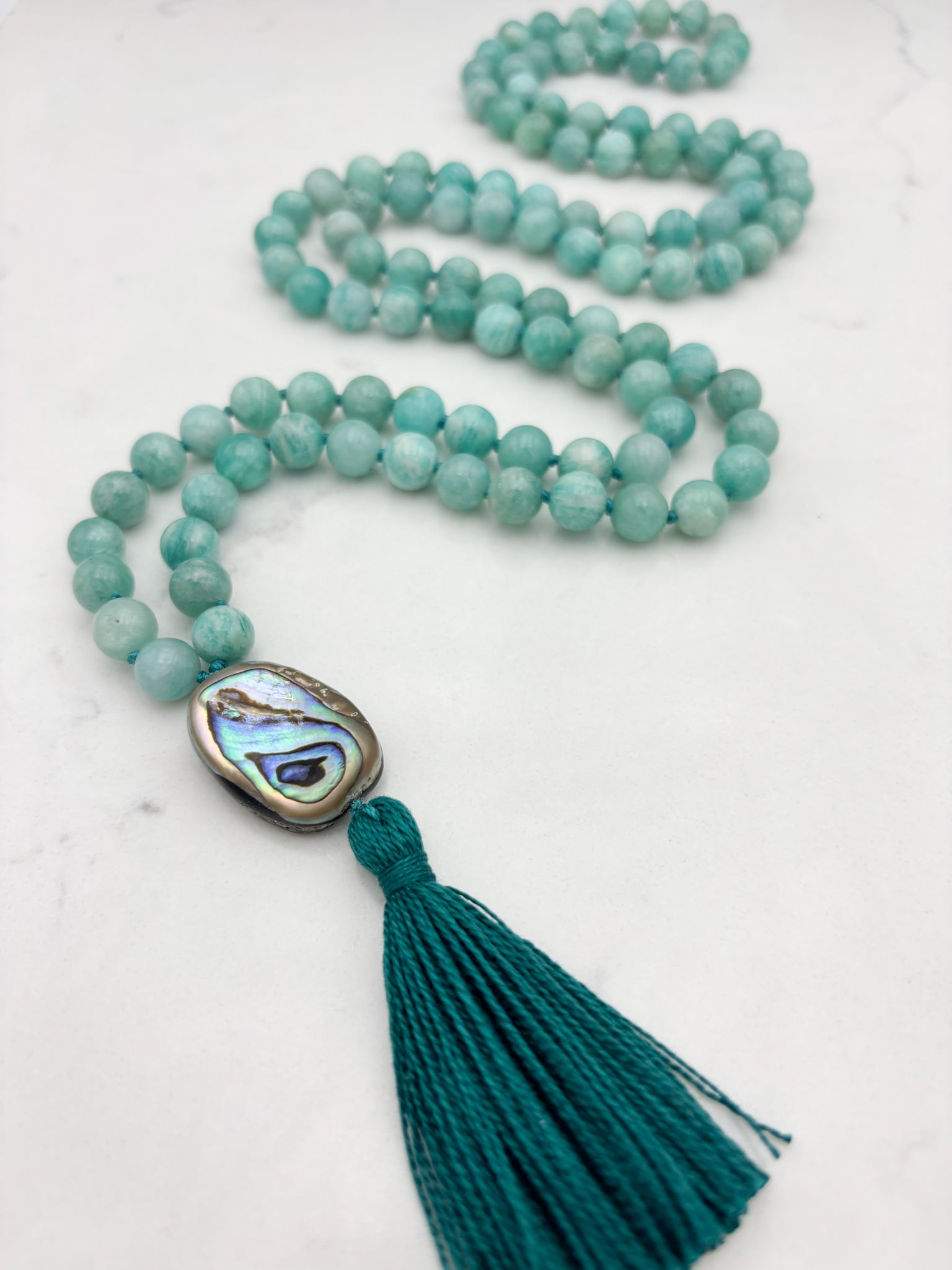amazonite gemstone mala wtih abalone guru bead and teal tassel | radiant malas | handmade in boulder, colorado