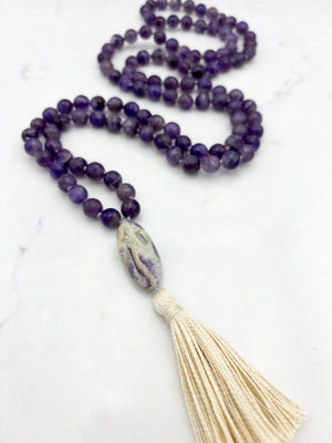 amethyst gemstone mala with chevron amethyst guru bead and cream tassel  | radiant malas | handmade in boulder, colorado