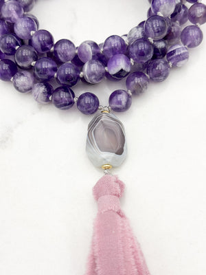 amethyst gemstone mala necklace with botswana agate guru bead and pink silk ribbon tassel | radiant malas | handmade in boulder, colorado
