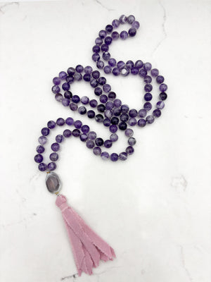 amethyst gemstone mala necklace with botswana agate guru bead and pink silk ribbon tassel | radiant malas | handmade in boulder, colorado