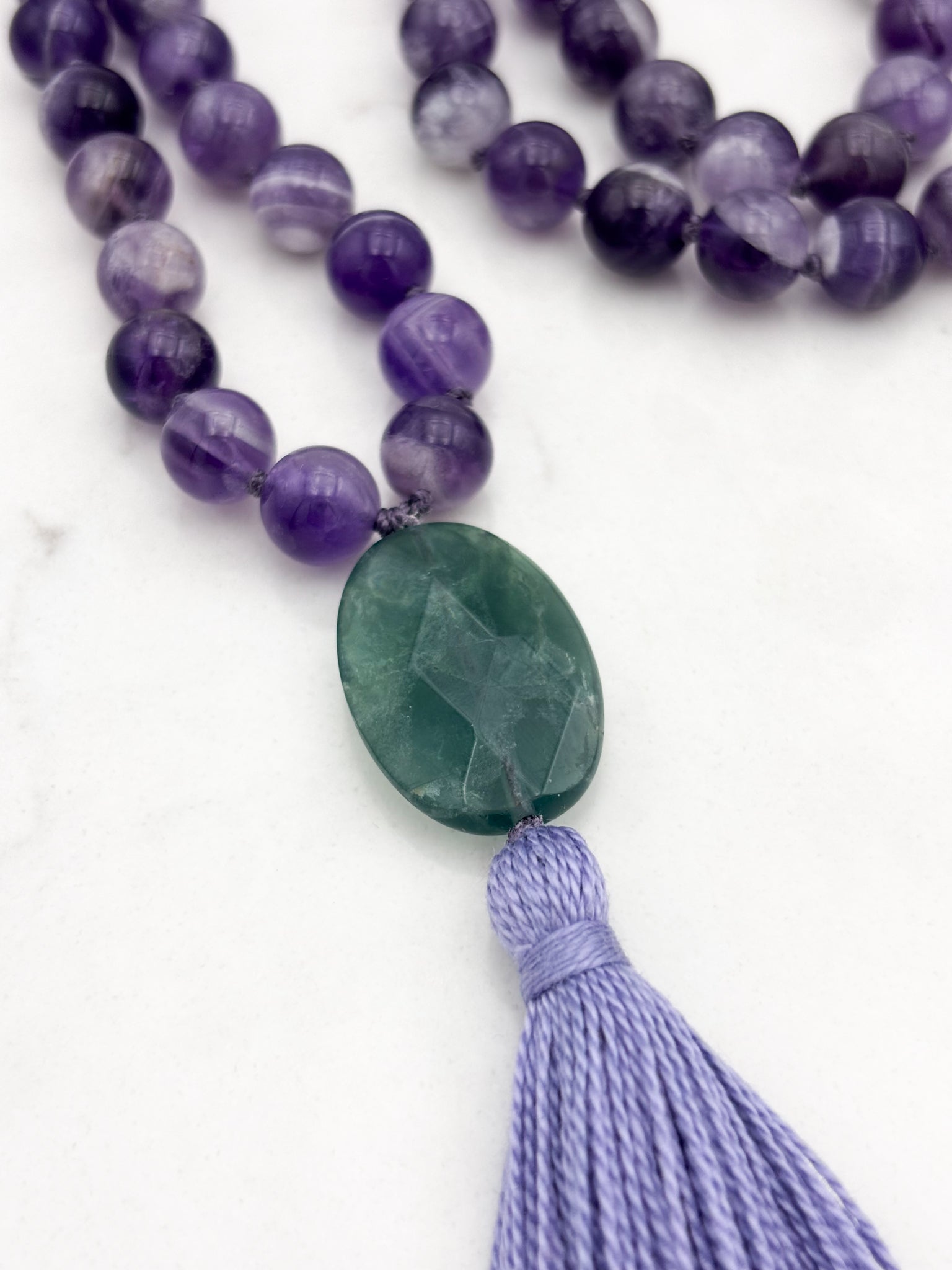 amethyst gemstone mala with fluorite guru bead and lavender tassel  | radiant malas | handmade in boulder, colorado