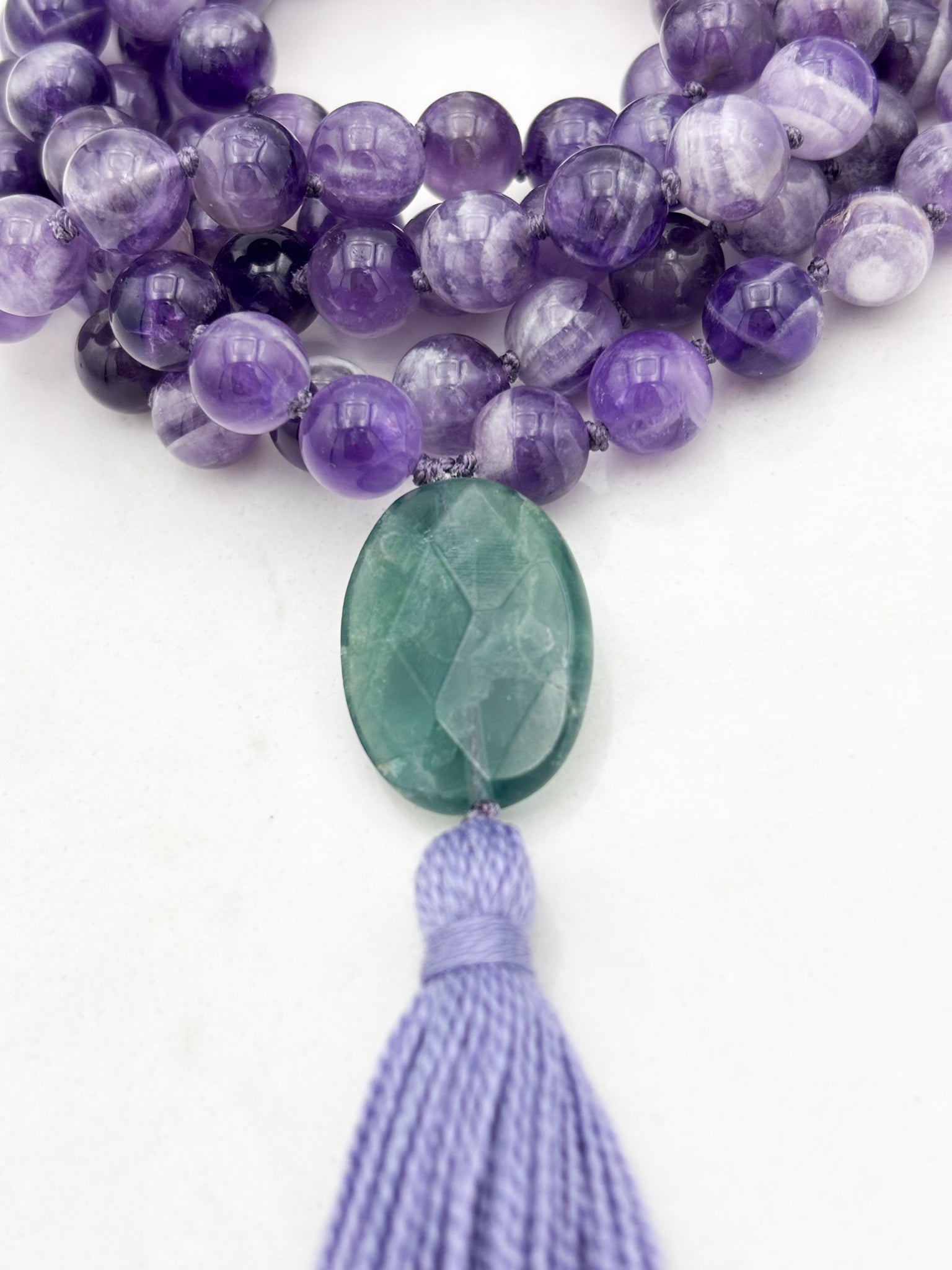 amethyst gemstone mala with fluorite guru bead and lavender tassel  | radiant malas | handmade in boulder, colorado