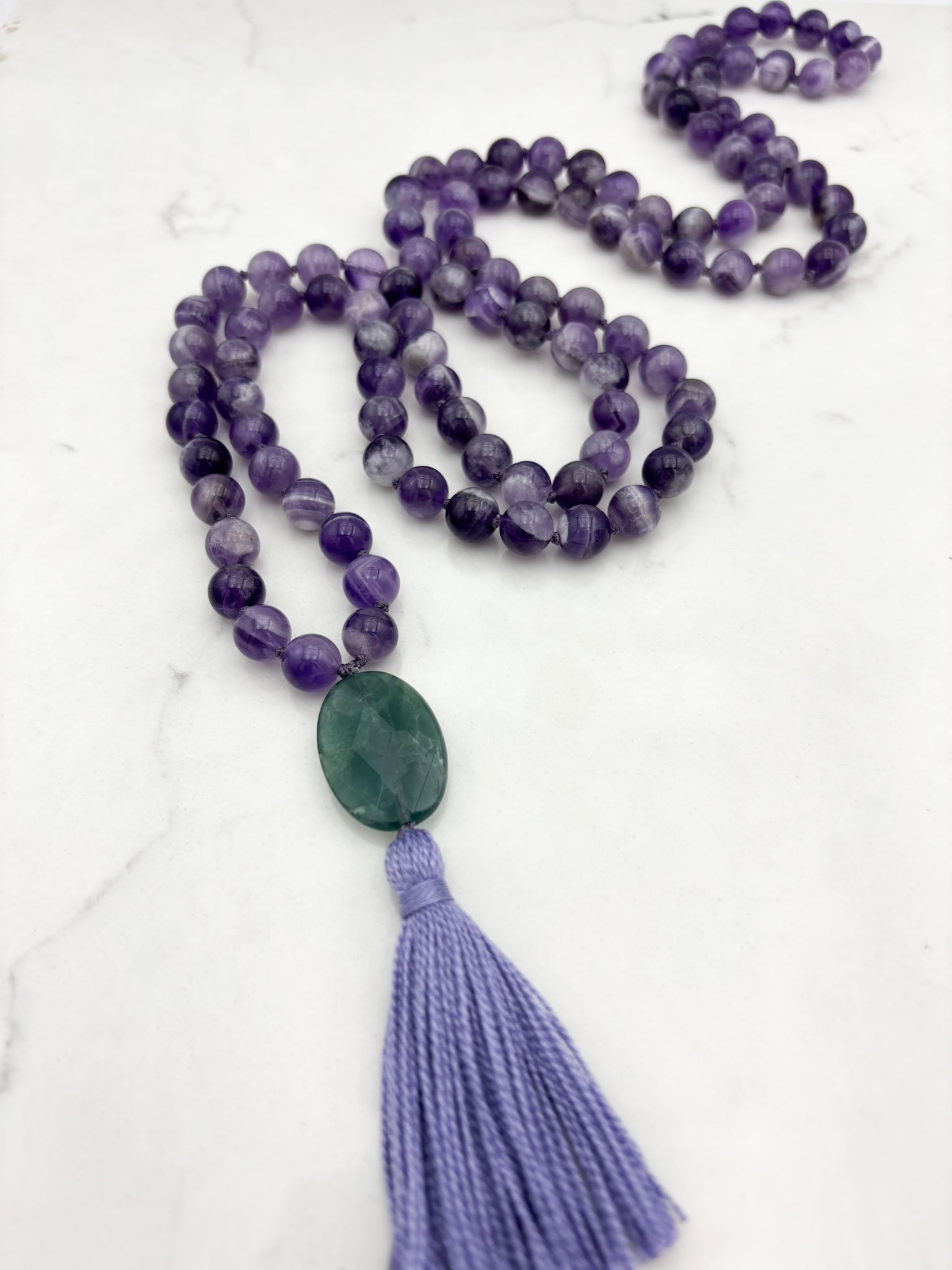 amethyst gemstone mala with fluorite guru bead and lavender tassel  | radiant malas | handmade in boulder, colorado