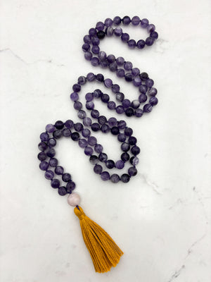 amethyst gemstone mala necklace with kunzite guru bead and gold tassel | radiant malas | handmade in boulder, colorado