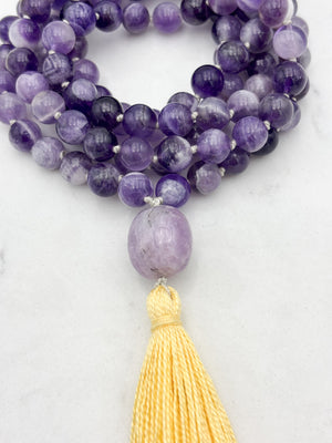 amethyst gemstone mala with lepidolite guru bead and yellow tassel | radiant malas | handmade in boulder, colorado