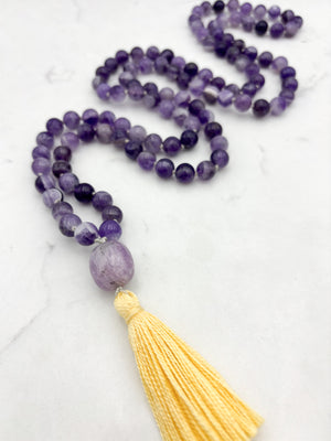 amethyst gemstone mala with lepidolite guru bead and yellow tassel | radiant malas | handmade in boulder, colorado