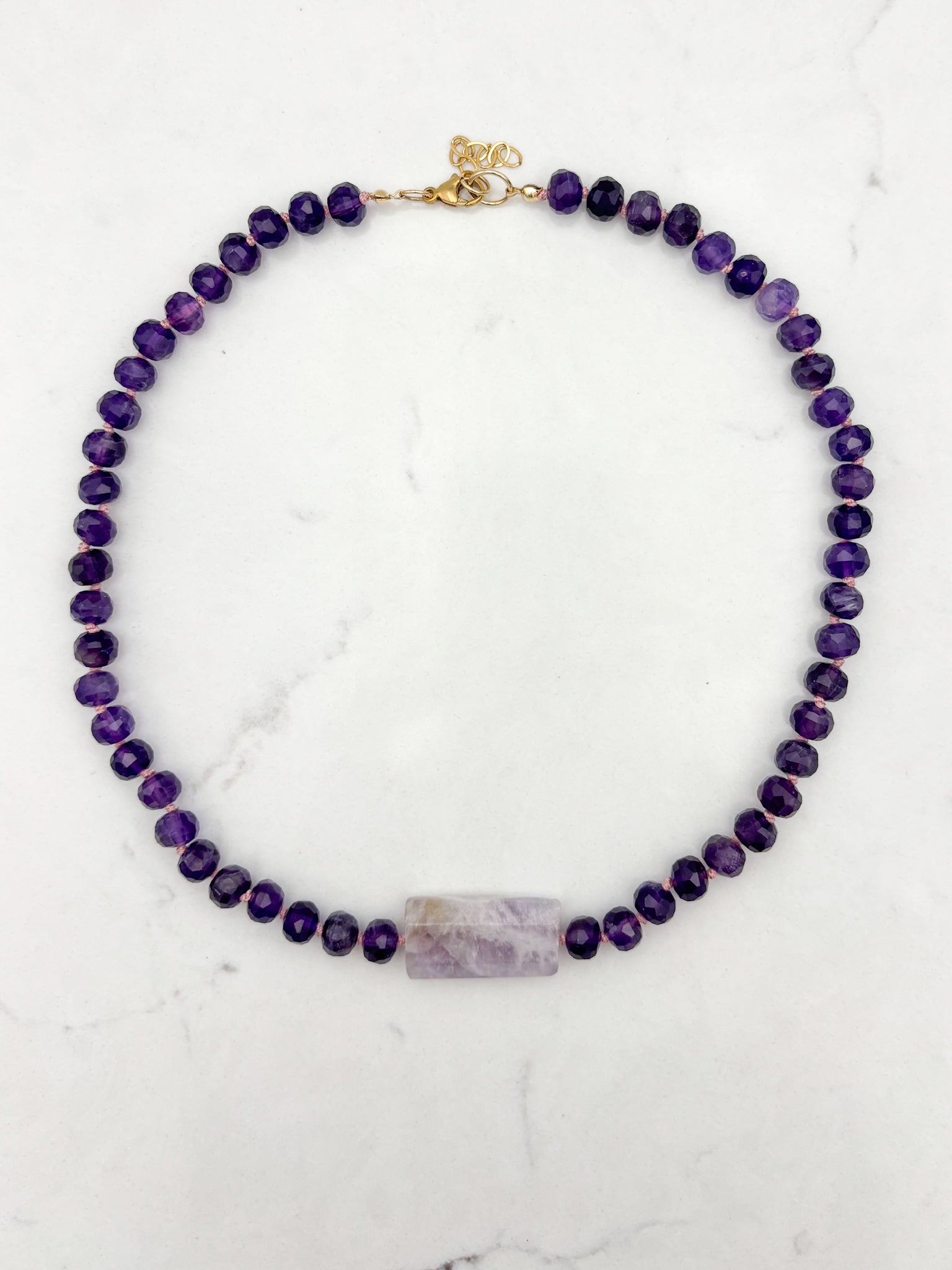 amethyst knotted gemstone necklace with pink amethyst center stone | radiant malas | handmade in boulder, colorado