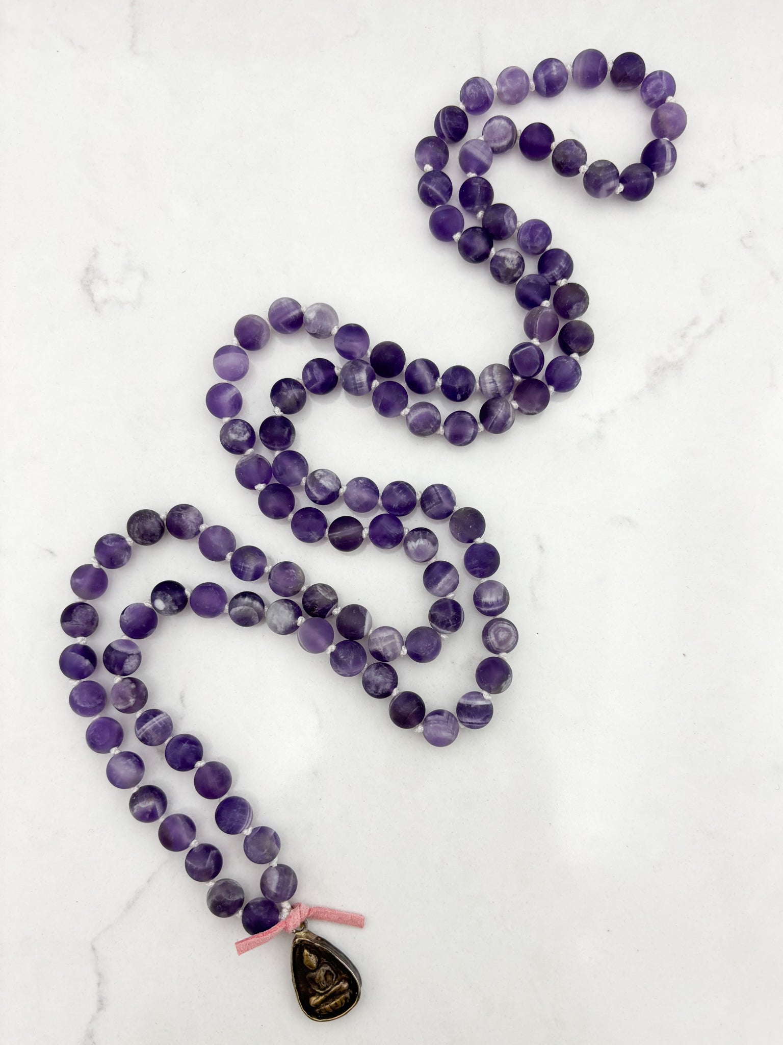 amethyst gemstone mala necklace with brass buddha pendant | radiant malas | handmade in boulder, colorado