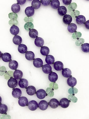 amethyst and fluorite gemstone mala with pink amethyst guru bead and green tassel | radiant malas | handmade in boulder, colorado