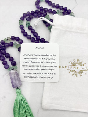 amethyst and fluorite gemstone mala with pink amethyst guru bead and green tassel | radiant malas | handmade in boulder, colorado