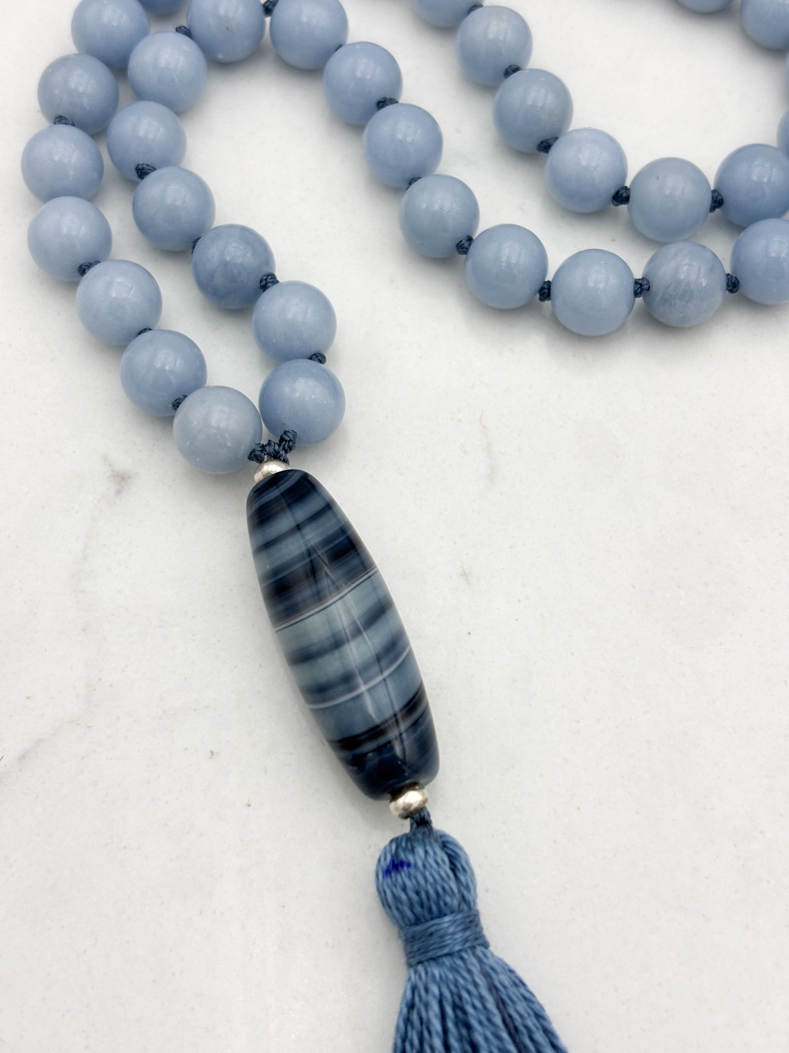 angelite gemstone mala with agate guru bead and blue tassel | radiant malas | handmade in boulder, colorado