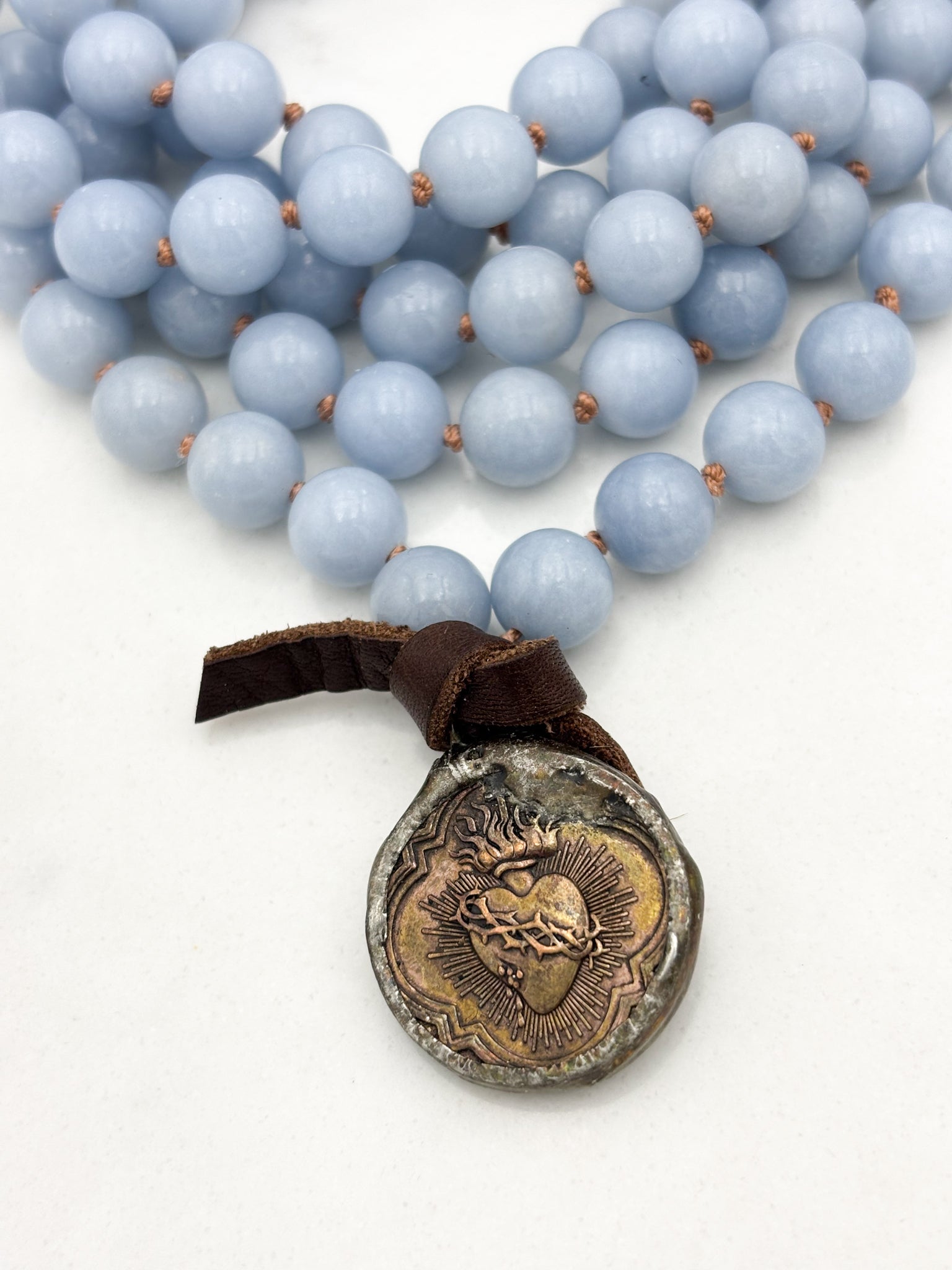 angelite gemstone mala necklace with brass pendant | radiant malas | handmade in boulder, colorado
