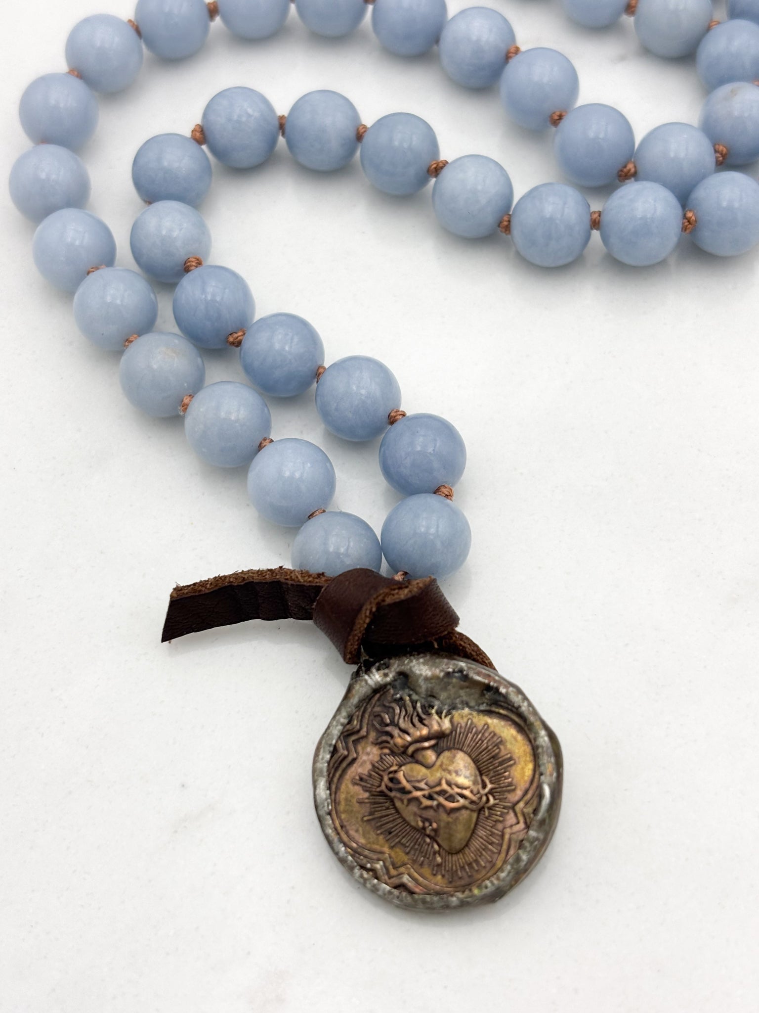 angelite gemstone mala necklace with brass pendant | radiant malas | handmade in boulder, colorado