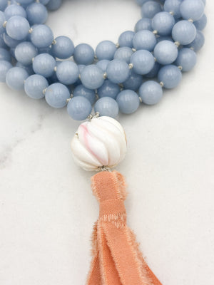 angelite gemstone mala with shell guru bead and peach silk tassel | radiant malas | handmade in boulder, colorado