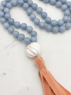 angelite gemstone mala with shell guru bead and peach silk tassel | radiant malas | handmade in boulder, colorado