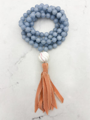 angelite gemstone mala with shell guru bead and peach silk tassel | radiant malas | handmade in boulder, colorado
