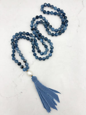 aquamarine gemstone mala with freshwater pearl uru bead and blue silk ro=ibbon tassel | radiant malas 
 handmade in boulder, colorado