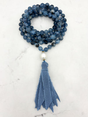 aquamarine gemstone mala with freshwater pearl uru bead and blue silk ro=ibbon tassel | radiant malas 
 handmade in boulder, colorado