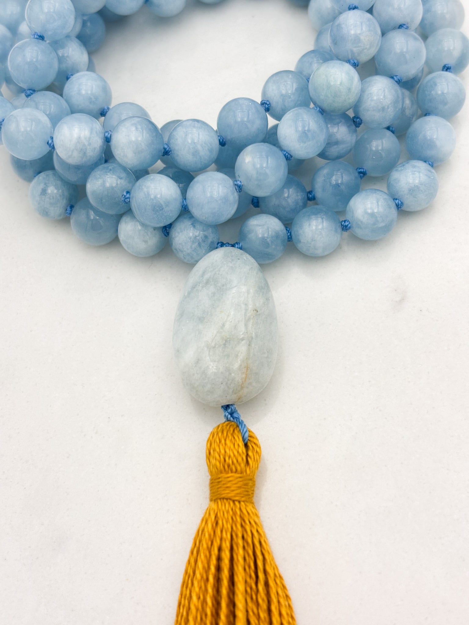 aquamarine gemstone mala with aquamarine guru bead and gold tassel | radiant malas | handmade in boulder, colorado