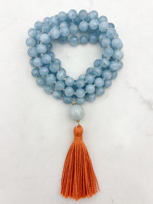 aquamarine gemstone mala with burma jade guru bead and orange tassel | radiant malas | handmade in boulder, colorado