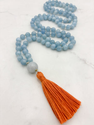 aquamarine gemstone mala with burma jade guru bead and orange tassel | radiant malas | handmade in boulder, colorado