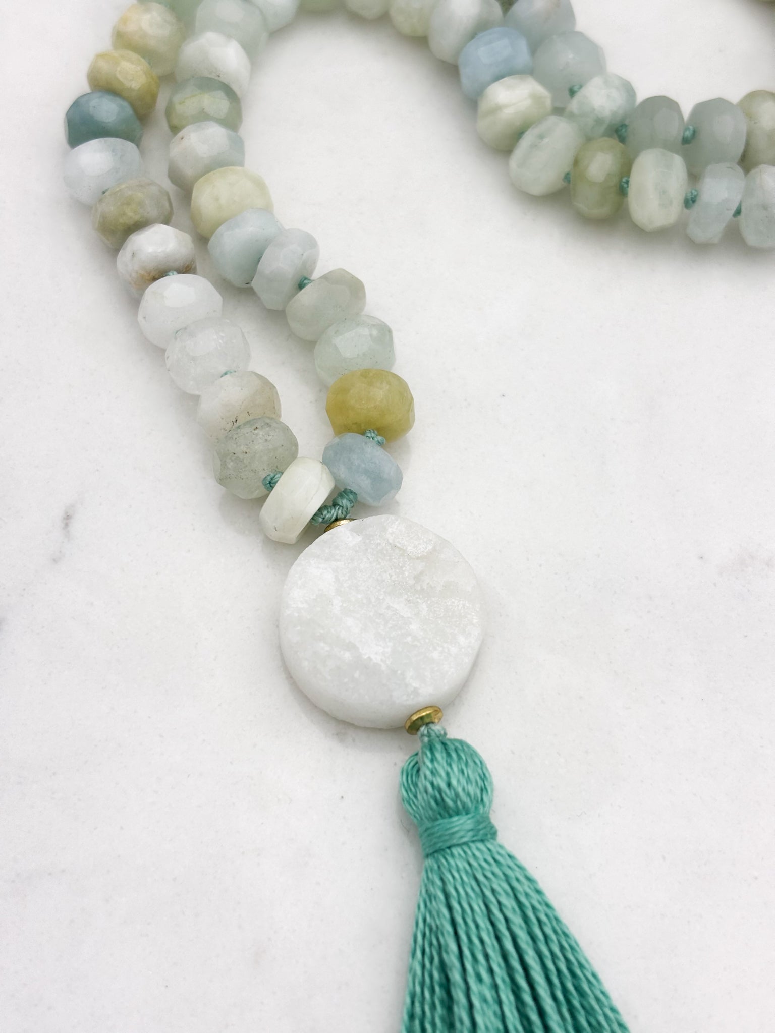 aquamarine gemstone mala necklace with druzy quartz guru bead and teal green tassel | radiant malas | handmade in boulder, colorado