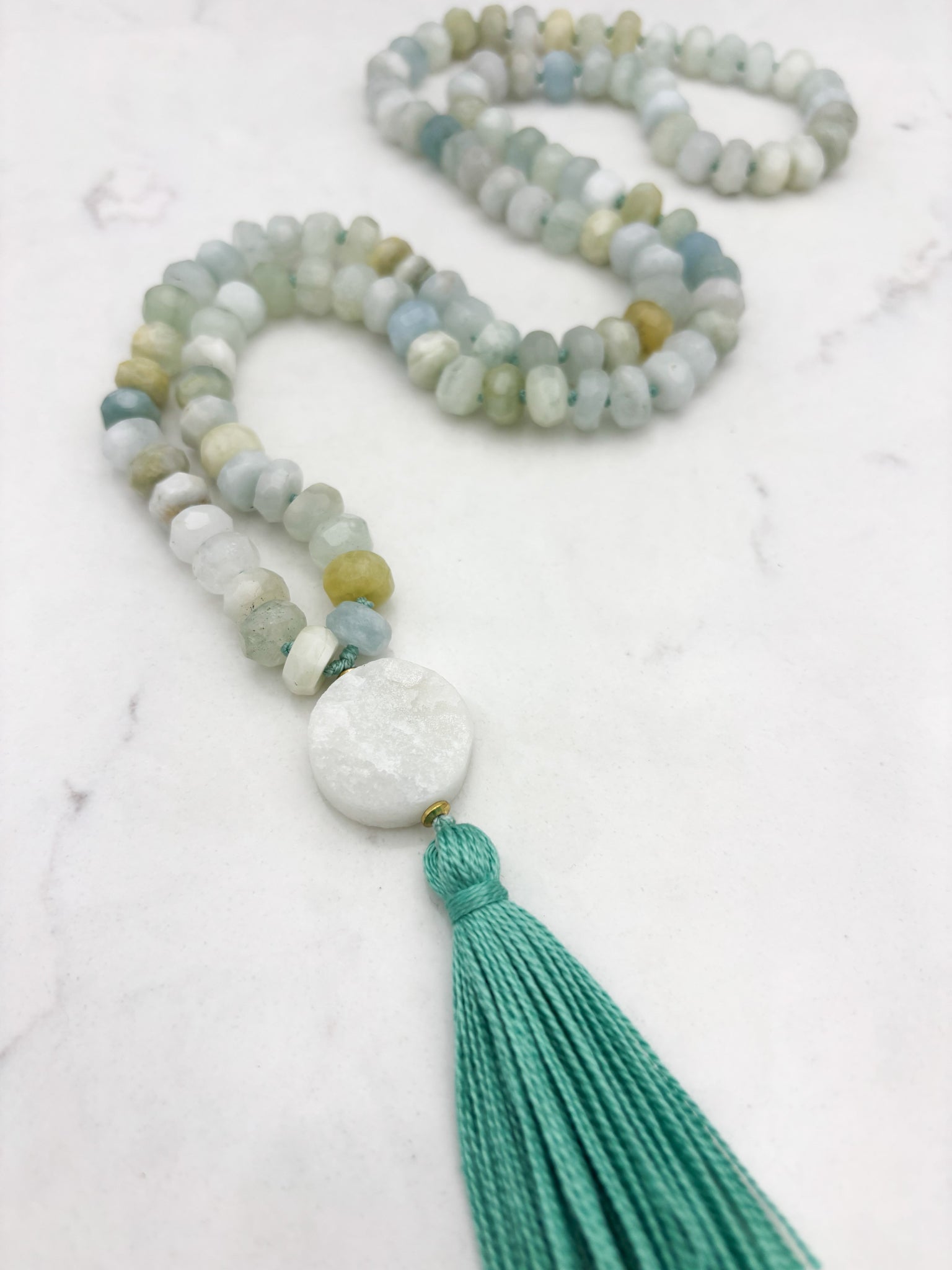 aquamarine gemstone mala necklace with druzy quartz guru bead and teal green tassel | radiant malas | handmade in boulder, colorado