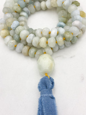 aquamarine gemstone mala with aquamarine guru bead and blue silk ribbon tassel | radiant malas 
 handmade in boulder, colorado