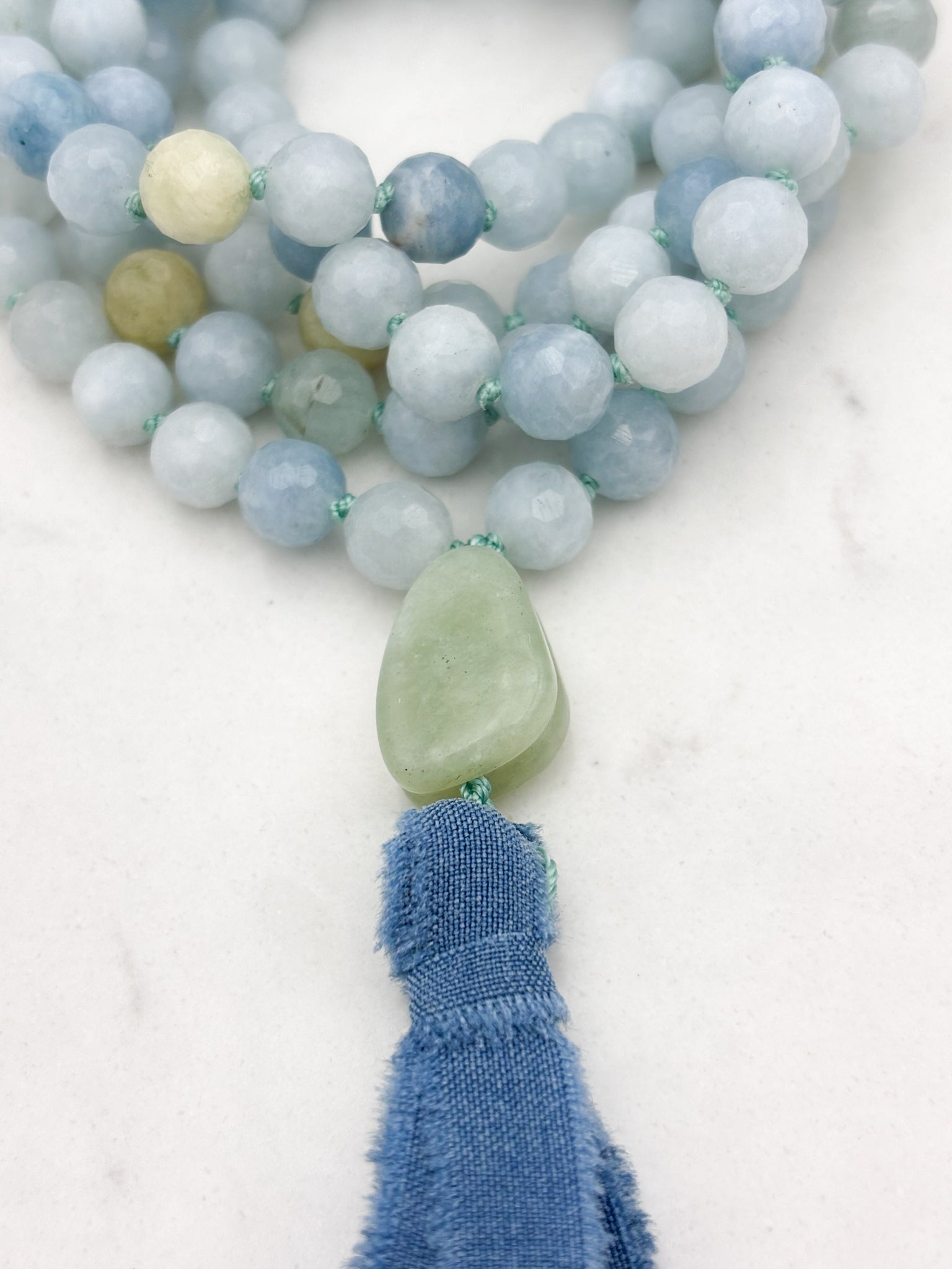 aquamarine gemstone mala with jade guru bead and blue silk tassel | radiant malas | handmade in boulder, colorado