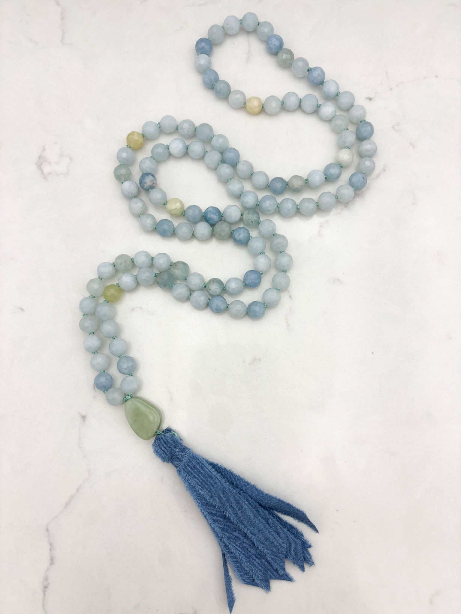 aquamarine gemstone mala with jade guru bead and blue silk tassel | radiant malas | handmade in boulder, colorado
