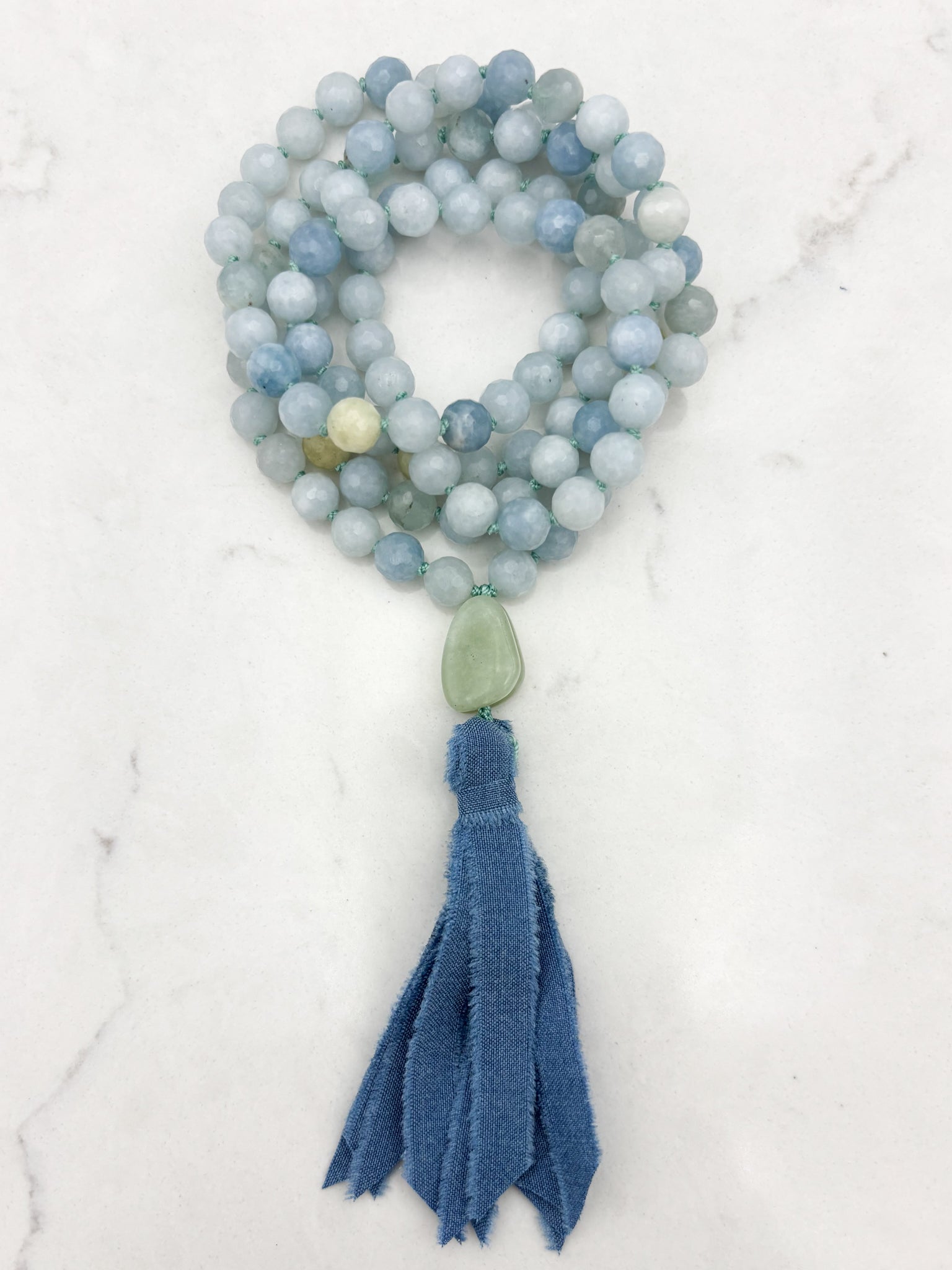 aquamarine gemstone mala with jade guru bead and blue silk tassel | radiant malas | handmade in boulder, colorado