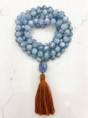 aquamarine gemstone mala with kyanite guru bead and rust colored tassel | radiant malas | handmade in boulder, colorado