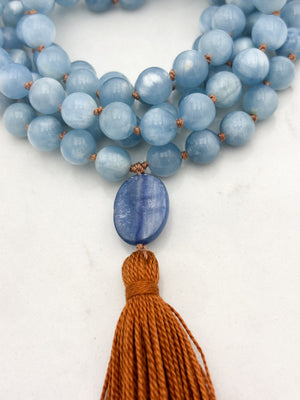 aquamarine gemstone mala with kyanite guru bead and rust colored tassel | radiant malas | handmade in boulder, colorado