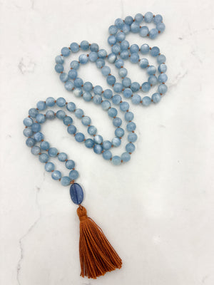 aquamarine gemstone mala with kyanite guru bead and rust colored tassel | radiant malas | handmade in boulder, colorado