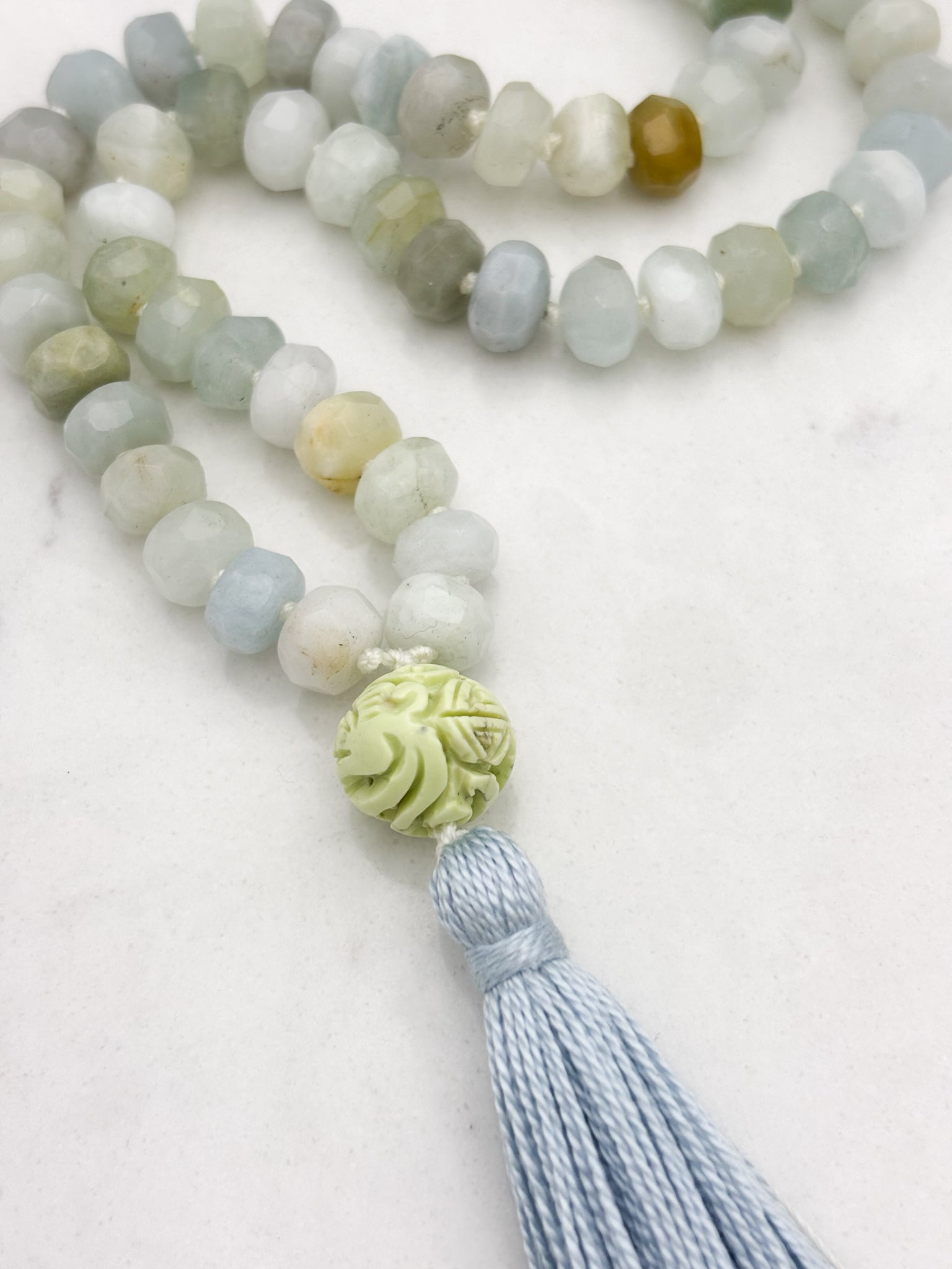 aquamarine gemstone mala necklace with lemon turquoise guru bead and blue tassel | radiant malas | handmade in boulder, colorado