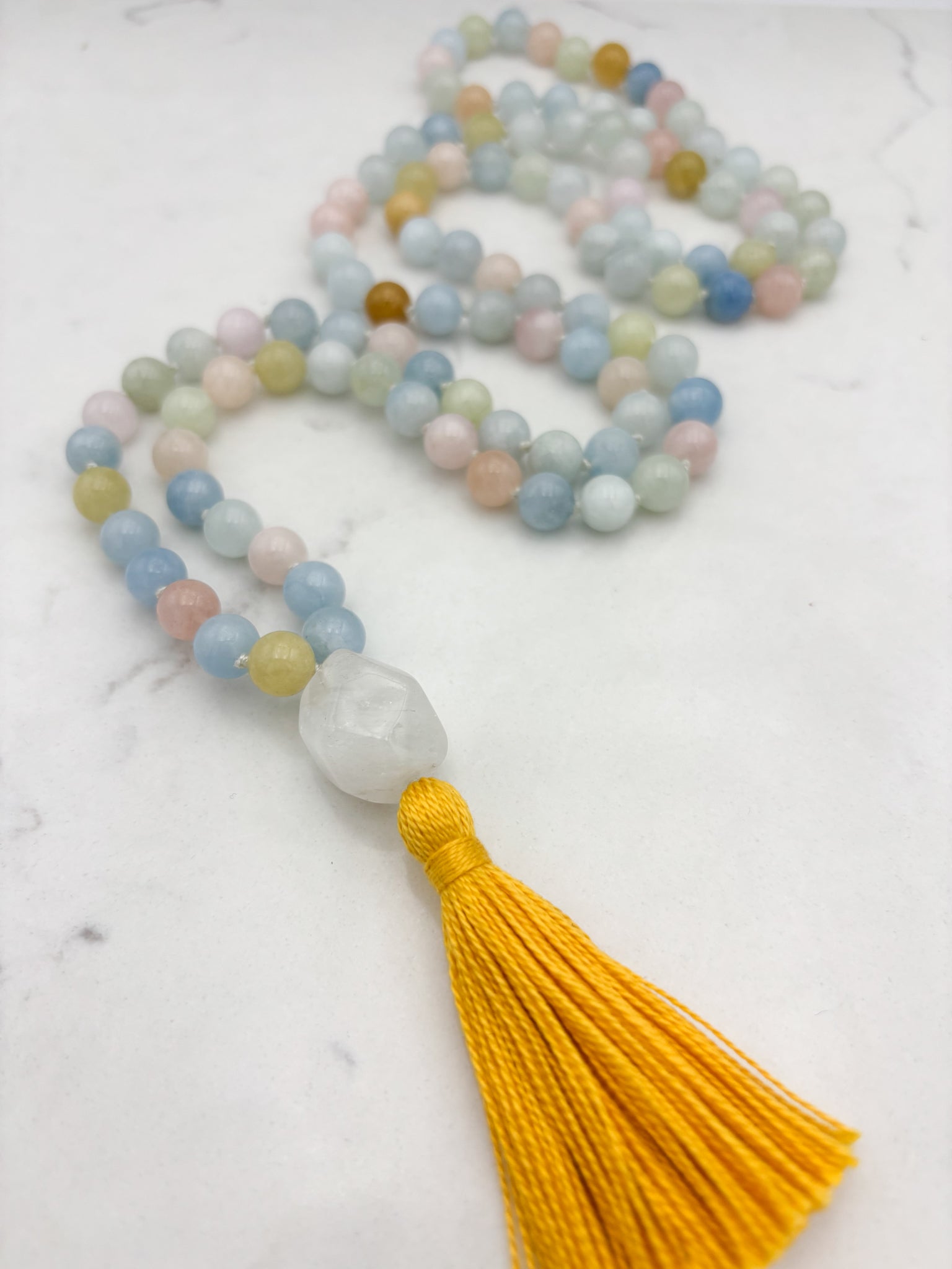 aquamarine gemstone mala with rock quartz guru bead and yellow tassel | radiant malas | handmade in boulder, colorado