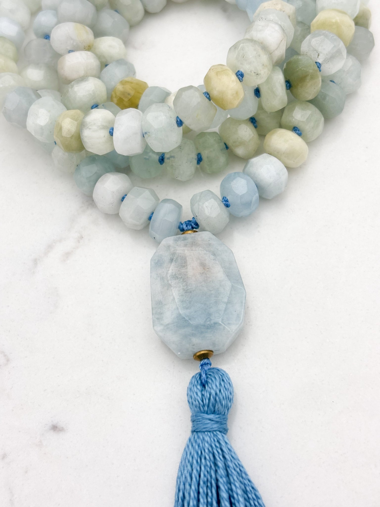 aquamarine gemstone mala necklace with aquamarine guru bead and blue tassel | radiant malas | handmade in boulder, colorado