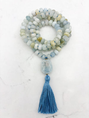 aquamarine gemstone mala necklace with aquamarine guru bead and blue tassel | radiant malas | handmade in boulder, colorado