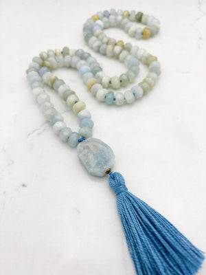 aquamarine gemstone mala necklace with aquamarine guru bead and blue tassel | radiant malas | handmade in boulder, colorado